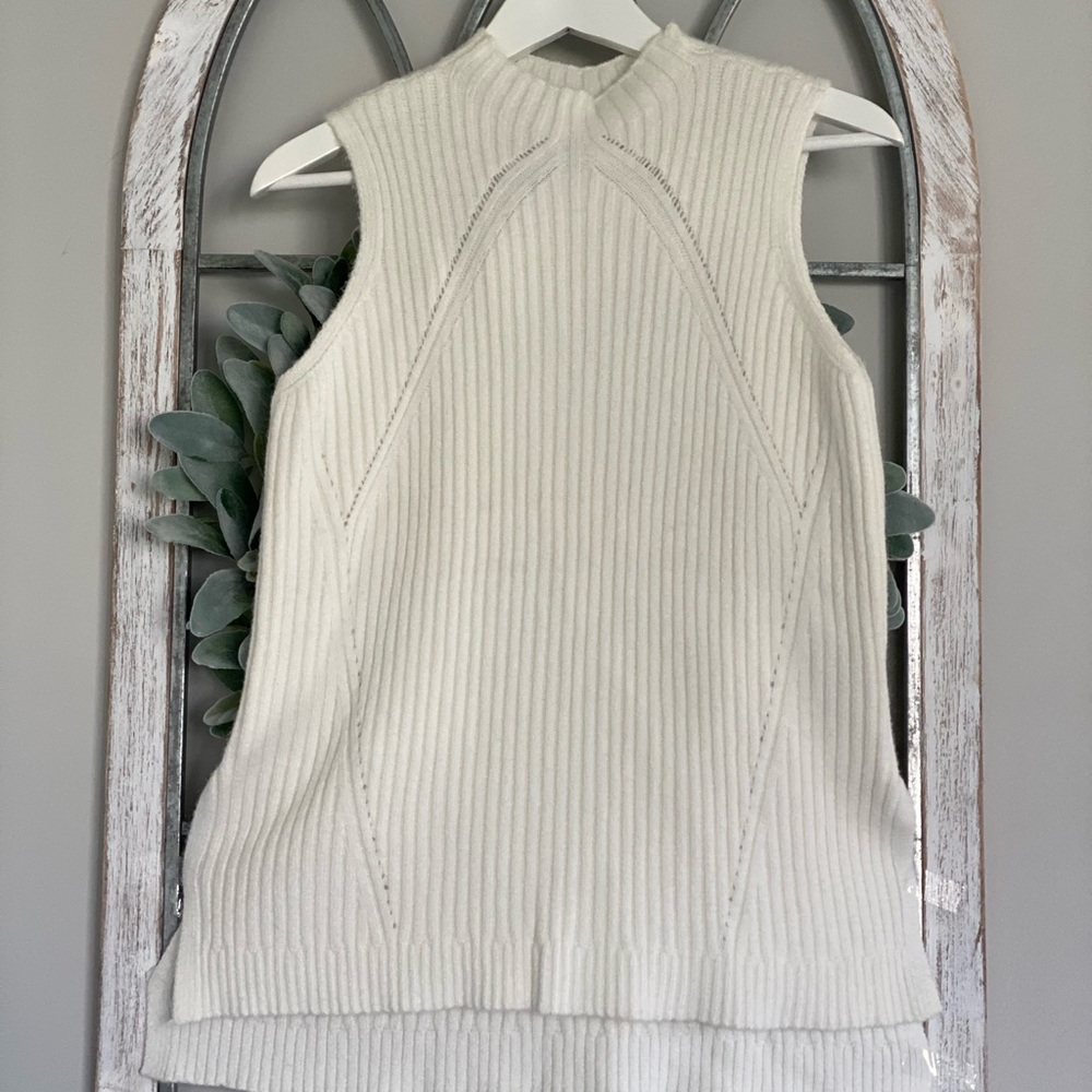 Sleeveless white womens sweater